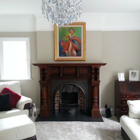 white living room with fireplace